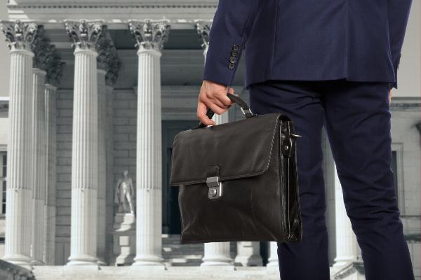 Lawyer holding briefcase 