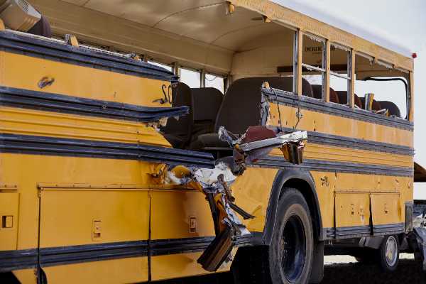 A school bus has damage due to an accident in Denver 